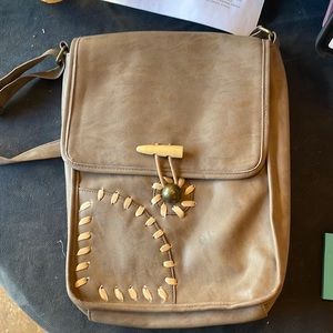 Flynn Ryder satchel.